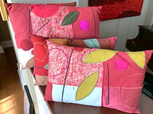 lot 82 image: Four Decorative Artist Designed Throw Pillows by Susan Hill