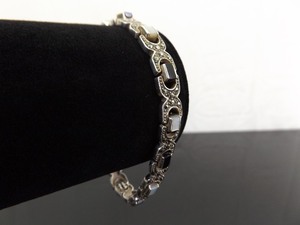 lot 57 image: .925 Sterling Silver Art Nouveau Inlayed Onyx and Mother of Pearl Bracelet