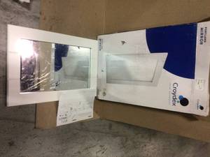lot 1 image: Maine 16 in. W x 24 in. H Framed Rectangular Bathroom Vanity Mirror in White by Croydex not used see pictures