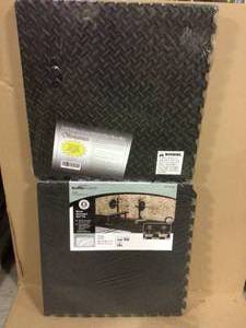 lot 5 image: Black 24 in. x 24 in. x 0.68 in. Foam Shock Absorbing Gym Floor (16 sq. ft.) (4-Pack) by TrafficMaster not used see pictures