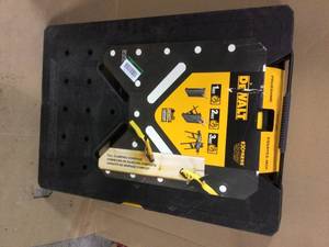 lot 16 image: 33 in. Folding Portable Workbench by DEWALT see picture