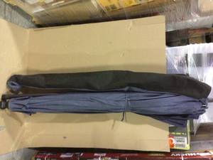 lot 20 image: 10 ft. Aluminum Auto-Tilt Market Outdoor Patio Umbrella in Sky Blue by Hampton Bay not used see pictures