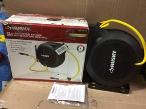 lot 51 image: 38 in. x 50 ft. Hybrid Retractable Hose Reel by Husky see pictures