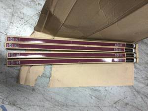 lot 73 image: Mix and Match 72 in. L - 144 in. L Telescoping 1 in. Single Curtain Rod Kit in Gunmetal lot not used see pictures