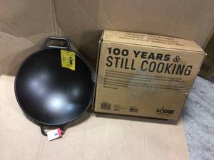 lot 81 image: 14 in. Cast Iron Wok with Loop Handles by Lodge not used see pictures