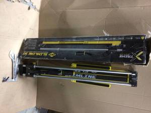 lot 82 image: 30 in. Slimline Professional Tile Cutter by QEP open box see pictures
