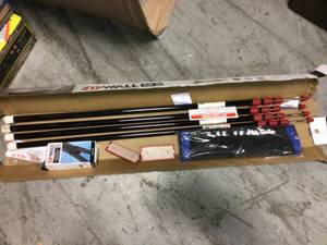 lot 97 image: ZipWall ZP4 Contains 4 10 ft. Steel Spring Loaded Poles 4-Heads, 4-Plates, 4-Tethers, 4-Grip Disks, 2-Zippers and 1-Carry Bag