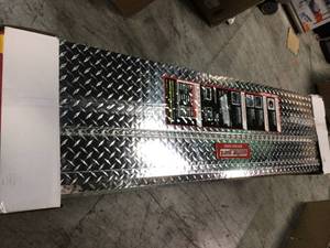 lot 104 image: Weather Guard 71.38 in. Diamond Plate Aluminum Full Size Crossbed Truck Tool Box see pictures