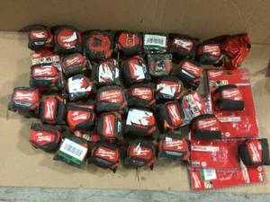 Lot of assorted Milwaukee tape meassure various sizes and conditions