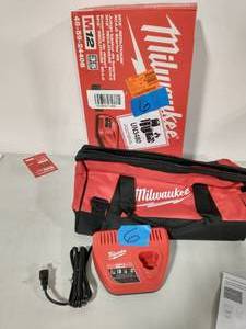 lot 6 image: MILWAUKEE CHARGER AND BAG