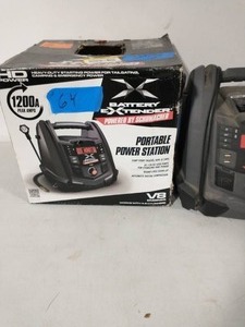 lot 64 image: Battery Extender 12-Volt 1,200 Amp Battery Jump Starter