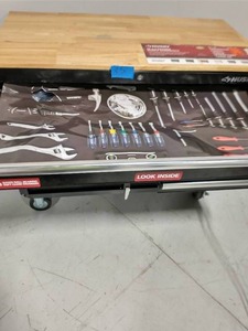 lot 85 image: HUSKY 46 in. W 9-Drawer, Deep Tool Chest Mobile Workbench in Gloss Black with Hardwood ToP WITH OUTLETS