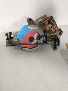 lot 76 image: RIDGID THRUCOOL 15 Amp 7-14 in. Worm Drive Circular Saw