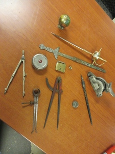 lot 307 image: TOLOEDO LETTER OPENER, GLOBE PENCIL SHARPENER, DIPIGOLD BUCKLE AND MORE