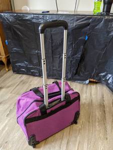 lot 331 image: American Tourister Rolling Luggage Bag