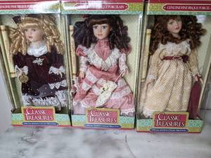 lot 365 image: Three NIB Classic Treasures Porcelain Dolls