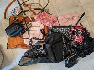 lot 424 image: Lot of 12 Pink, Black & Brown Purses