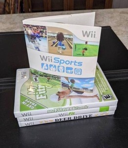 lot 374 image: Four Wii Games - see photos