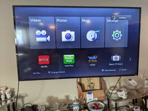 lot 2 image: Vizio Smartcast 65 Wall Mounted TV w Remote and Blu Ray Player
