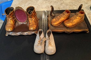 lot 553 image: Bronzed Childrens Shoes