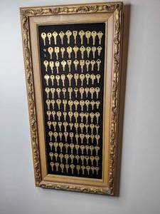 lot 560 image: Framed Key Wall Art