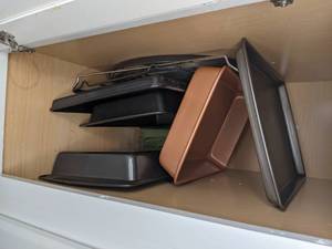 lot 514 image: Pizza Stone, Cake Pan, Cookie Sheets, etc.