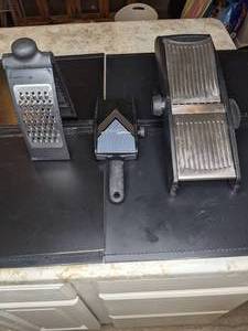 lot 518 image: Pair of Cheese Slicers & Grater