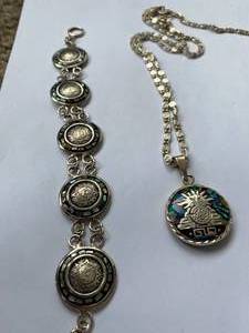 lot 63 image: .925 Sterling Silver  Mayan Necklace and Bracelet imbedded with precious stones.