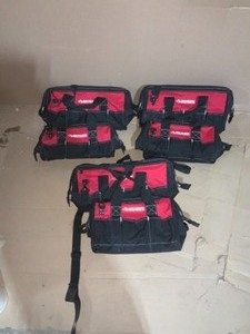 lot 44 image: DEWALT, MILWAUKEE, AND HUSKY TOOL BAGS MOST NEW OTHERS OPEN BOX SEE PICS