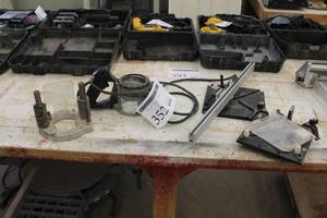 lot 352 image: Porter-Cable Router Base 6911 with Router Accessories