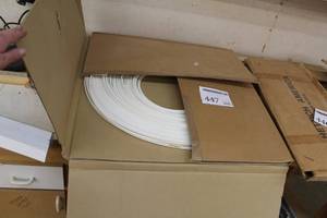 lot 447 image: Large Spool of Weather Stripping White (in box)