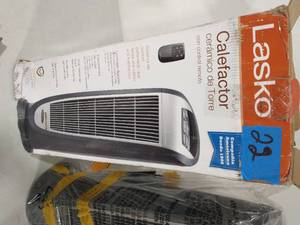 Tower 23 in. 1500-Watt Electric Ceramic Oscillating Space Heater with Digital Display and Remote Control