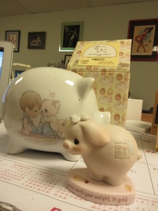 lot 425 image: PRECIOUS MOMENTS YOURE WORTH YOUR WEIGHT IN GOLD AND ONE MORE BANK