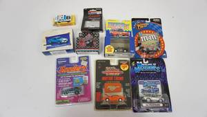 lot 16 image: Vintage Nascar, Muscle Machines, RAcing Champions, Thunder Jets, Hallmark Keepsake, Matchbox Cars, Sizzlers