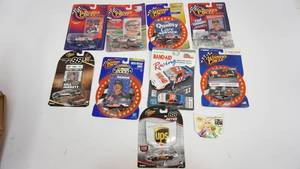 lot 65 image: New Collectible Dale Jarrett #88 Cars &1 - #32 Car - #28 Sign