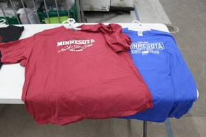 lot 252 image: Lot of (4) T-Shirt (new) - Noble Wear Minnesota North Star State 1858  2X-Large Red (x3), Gildan Explore Minnesota North Wood 1858 Ultra Cotton 3X-Large Blue (x1)