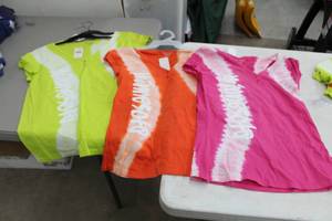lot 285 image: Lot of (4) Bay Studio Tie-Dye T-Shirt Womens Small 100% Cotton Green (x2), Orange (x1), Pink (x1) with Minnesota Logo (new)