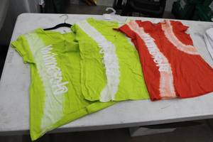 lot 286 image: Lot of (3) Bay Studio Tie-Dye T-Shirt Womens Medium 100% Cotton Green (x2), Orange (x1) with Minnesota Logo (new)