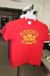lot 315 image: Lot of (9) Delta Pro Weight T-Shirt Youth Medium 100% Cotton Red,Burgundy,Green,Grey with Minnesota Outfitters Logo (new)