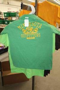 lot 319 image: Lot of (9) Gilden Heavy Cotton T-Shirt Youth Large 100% Cotton Brown (x7), Light Green (x1), Dark Green (x1) with Minnesota Outfitters Logo (new)