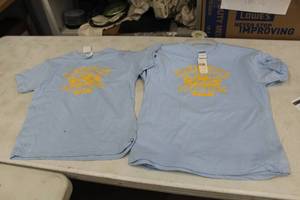 lot 320 image: Lot of (7) Gilden Heavy Cotton T-Shirt Youth Large 100% Cotton Light Blue with Minnesota Outfitters Logo (new)