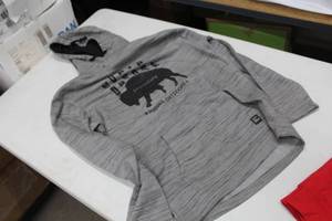 lot 433 image: Jake Austin Hooded Sweatshirt Medium 80% Cotton 20% Polyester GreyBlack with North Dakota Legendary Bison Logo (new)
