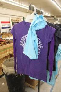 lot 466 image: Lot of (3) Clothing - T-Shirt (x2), Long Sleeve Hooded Sweatshirt (x1) Womens Medium,Large Light Blue, Purple with North Dakota Bakken Oil Field Logo (new)