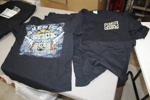 lot 507 image: Lot of (12) Gildan Heavy Cotton T-Shirt Medium 100% Cotton Black with America Stick to your GUNS Its Your Right Logo (new)
