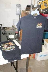 lot 546 image: Lot of (10) Gildan Heavy Cotton T-Shirt Small 100% Cotton Black with God Guns & Guts Made America Lets Keep All Three Logo (new)