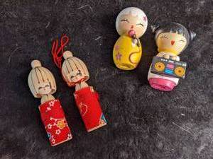 lot 66 image: Wood Asian Dolls