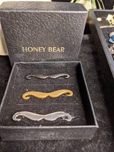 lot 220 image: Set of 3 Mustache Brooches by Honey Bear