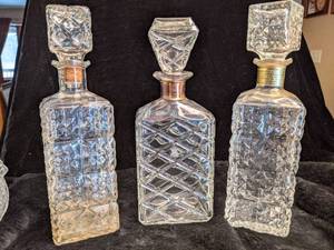 lot 27 image: Set of 3 Crystal Decanters