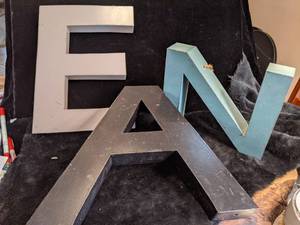 lot 33 image: Metal Letters E, A and N
