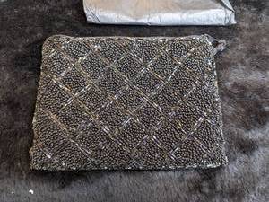 lot 107 image: Vintage Beaded Lancome Magie Noire Handbag